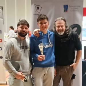 Podio Di Girolamo con maestri Favaretto e Lazzaroni (foto Paola Luciani)